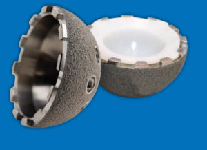 This Exactech hip component resembles a coconut: the shell makes up the outside, and the white plastic material is the Connexion GXL Liner.